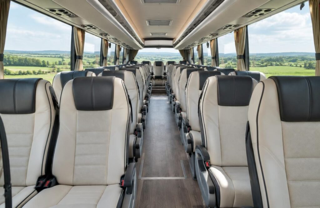 Charter bus interior with leather reclining seats