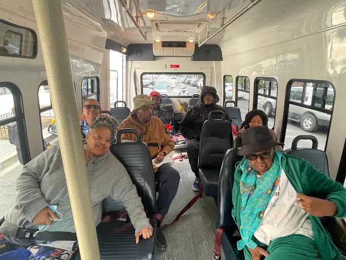 Passengers riding a minibus shuttle in Washington DC